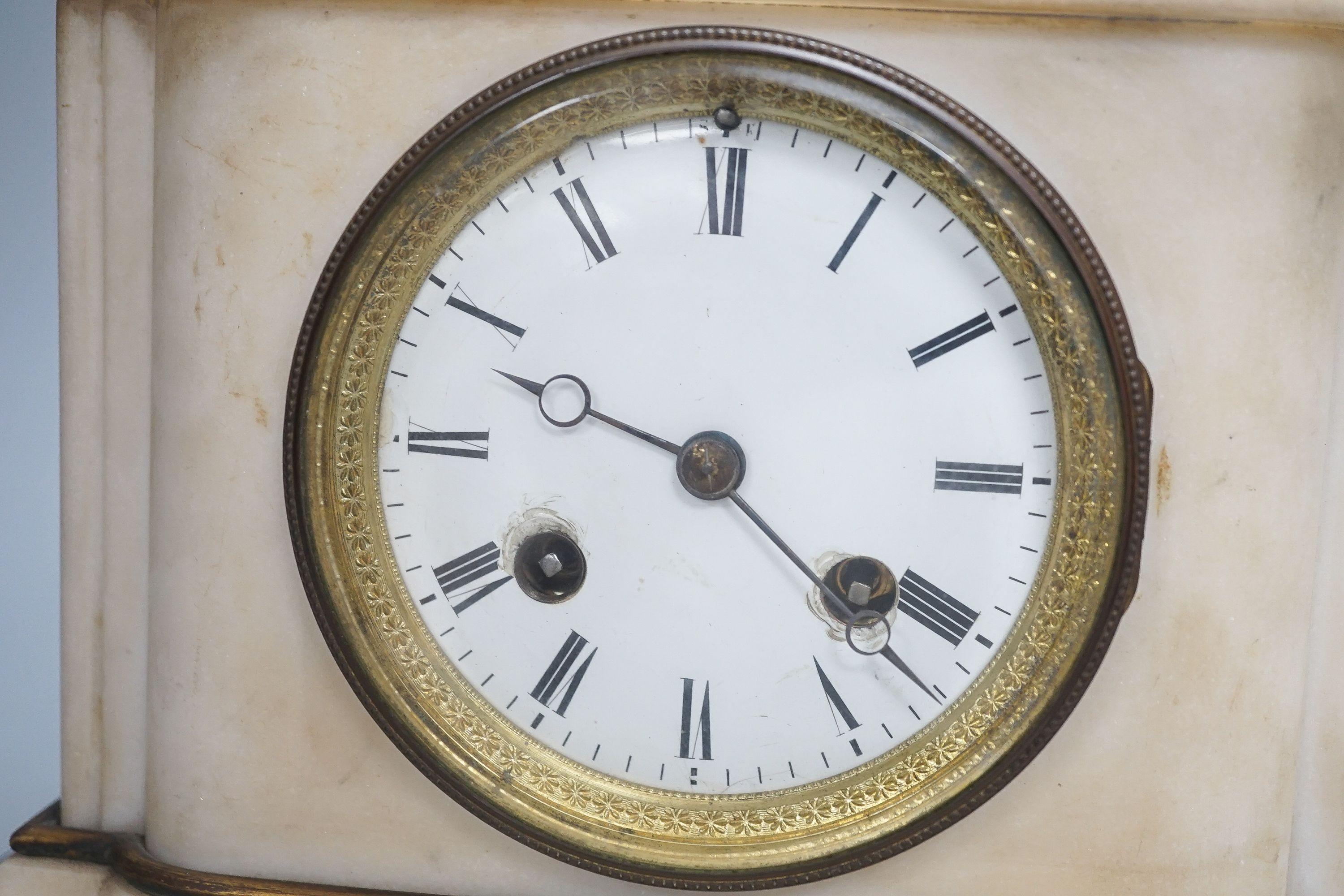 A late 19th century French white marble and ormolu mounted mantel clock 33cm